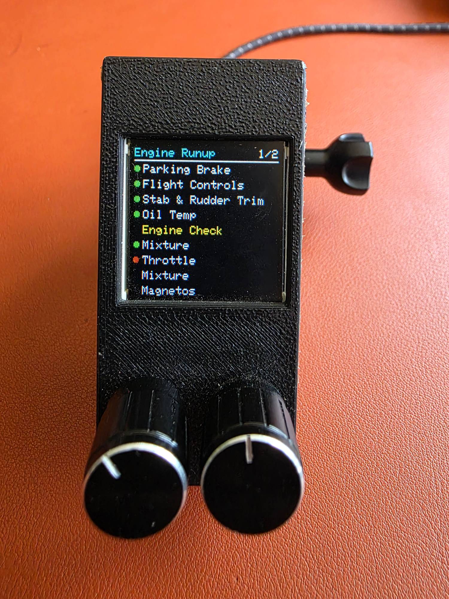 The handheld checklist box running the Engine Runup checklist